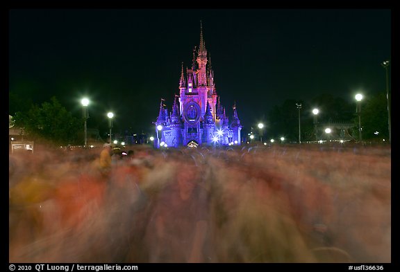 Blurry crowds and Cinderella Castle, Walt Disney World. Orlando, Florida, USA (color)