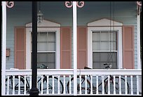 Bicycle on pastel-colored porch. Key West, Florida, USA