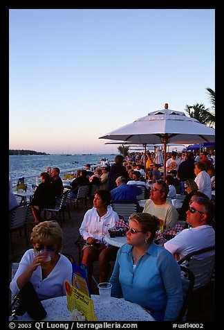 Crowds celebrating sunset at Mallory Square. Key West, Florida, USA (color)
