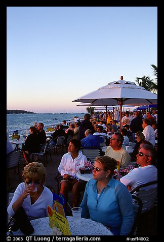 Crowds celebrating sunset at Mallory Square. Key West, Florida, USA