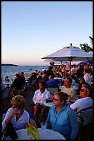 Crowds celebrating sunset at Mallory Square. Key West, Florida, USA (color)