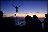 Equilibrist on Mallory Square at sunset. Key West, Florida, USA