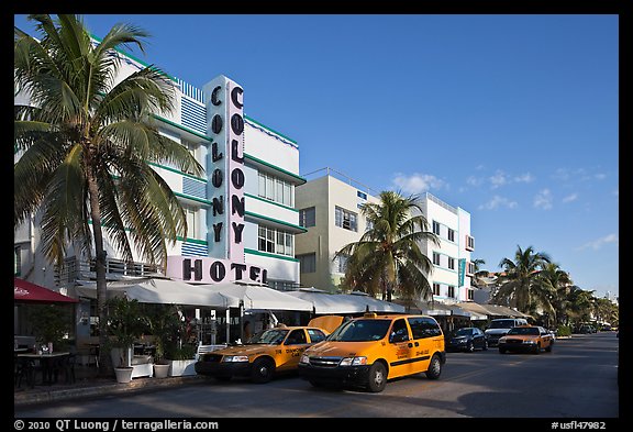 Taxi cabs and row of hotels in art deco architecture, Miami Beach. Florida, USA