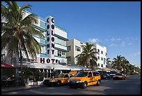 Taxi cabs and row of hotels in art deco architecture, Miami Beach. Florida, USA