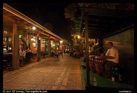Musicians and restaurant at night, Mallory Square. Key West, Florida, USA (color)