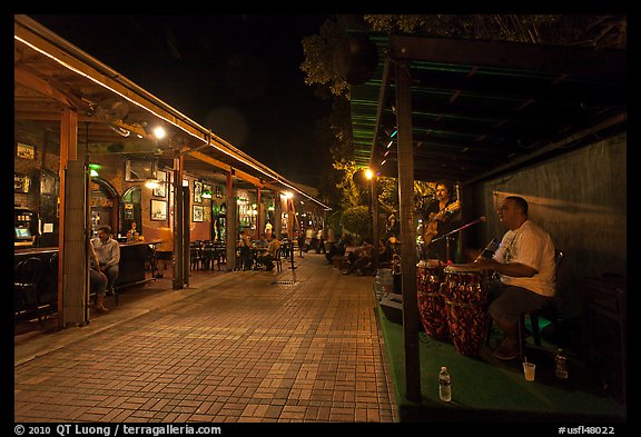 Musicians and restaurant at night, Mallory Square. Key West, Florida, USA