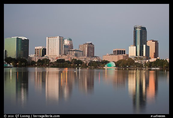 Skyline at dawn from lake Eola. Orlando, Florida, USA (color)
