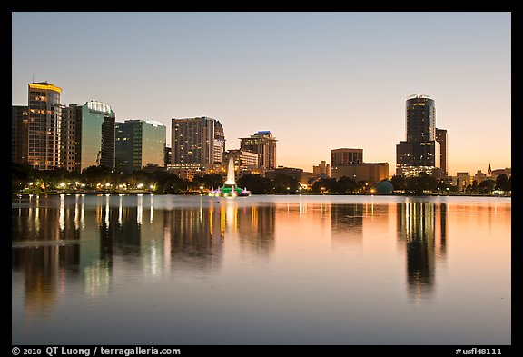 Downtown skyline at sunset, lake Eola. Orlando, Florida, USA (color)