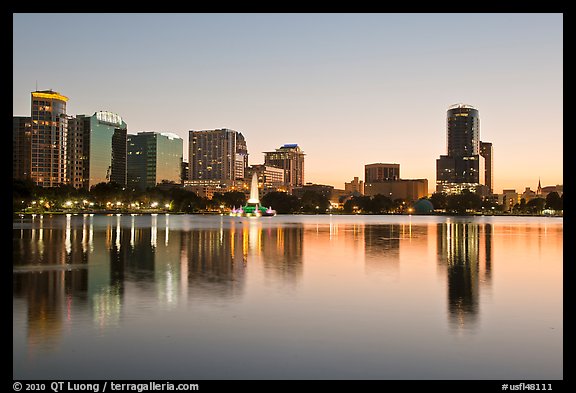 Downtown skyline at sunset, lake Eola. Orlando, Florida, USA