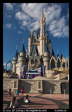 Girls in front of Cindarella castle, Walt Disney World. Orlando, Florida, USA