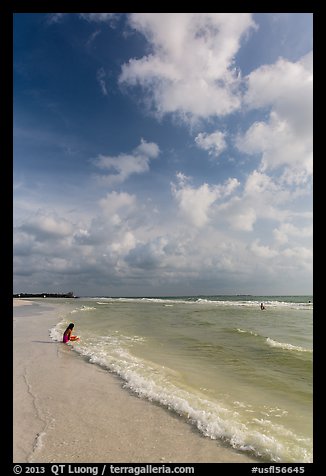 Woman and wave, Fort De Soto beach. Florida, USA (color)