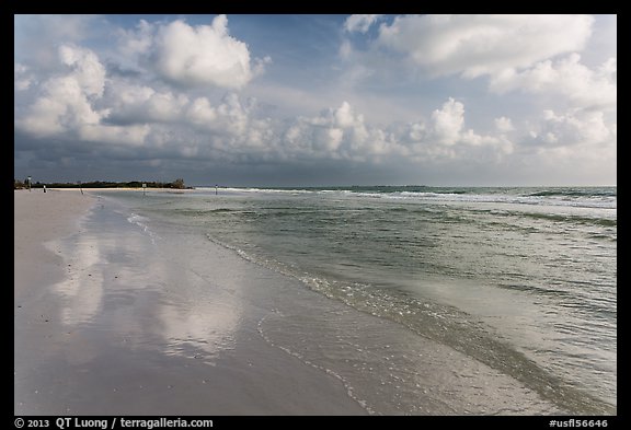 Sky reflecting in wet sand, Fort De Soto beach. Florida, USA