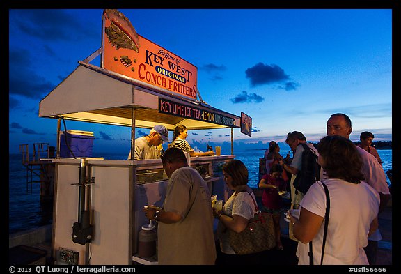People buying food at stand on Mallory Square. Key West, Florida, USA