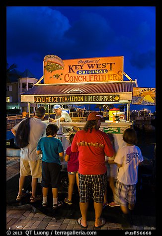 Key lime and conch fritters food stand at night. Key West, Florida, USA (color)