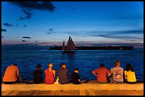 Tourists watching ocean after sunset, Mallory Square. Key West, Florida, USA ( color)