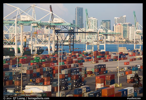 Shipping containers, cranes, and skyline, Miami. Florida, USA (color)