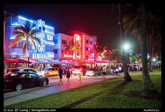 Street with row of Art Deco hotels at night, South Beach District, Miami Beach. Florida, USA (color)