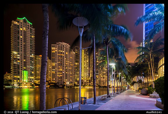 Miami Riverwalk and Miami River, Brickell district, night, Miami. Florida, USA (color)