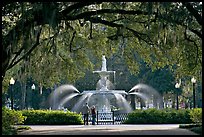 Fountain in Forsyth Park with couple standing. Savannah, Georgia, USA (color)