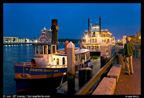 Ferry and riverboat on Savannah River at dusk. Savannah, Georgia, USA