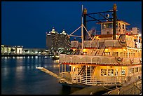 Riverboat and Savannah River at night. Savannah, Georgia, USA