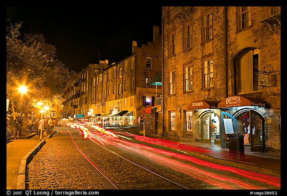 Car lights on River Street by night. Savannah, Georgia, USA (color)