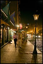 People on sidewalk of River Street by night. Savannah, Georgia, USA ( color)
