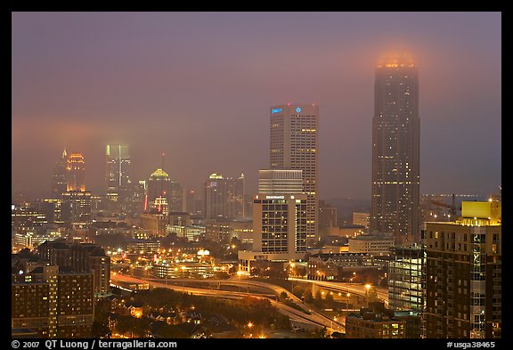 Mid-town high rise buildings in fog a dawn. Atlanta, Georgia, USA (color)