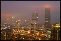 Mid-town high rise buildings in fog a dawn. Atlanta, Georgia, USA (color)