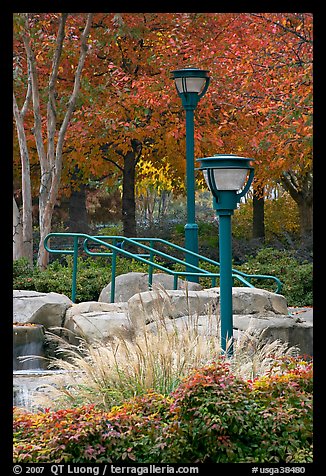 Lamp posts and foliage in autum colors, Centenial Olympic Park. Atlanta, Georgia, USA