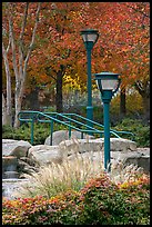 Lamp posts and foliage in autum colors, Centenial Olympic Park. Atlanta, Georgia, USA