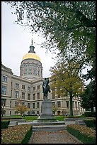 Statue and Georgia Capitol in fall. Atlanta, Georgia, USA