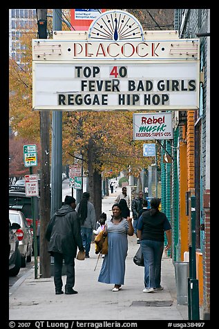 African American people on sidewalk in front of Peackok music store. Atlanta, Georgia, USA (color)
