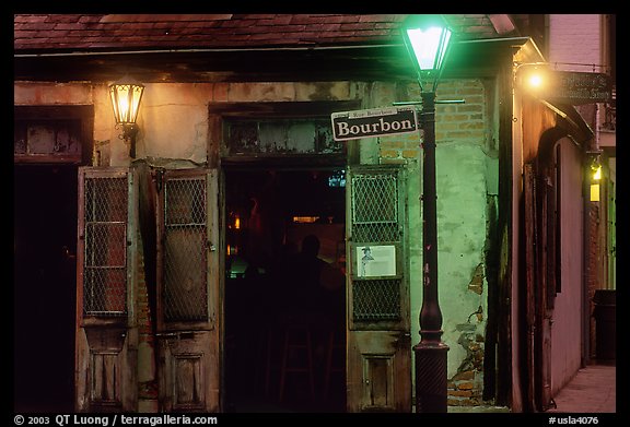 Cafe on Bourbon street at night, French Quarter. New Orleans, Louisiana, USA