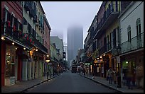 Bourbon street and the new town in the fog, French Quarter. New Orleans, Louisiana, USA (color)