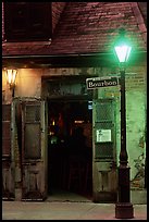 Cafe on Bourbon street at night, French Quarter. New Orleans, Louisiana, USA