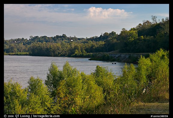 Banks of the Mississippi River with small boat. Natchez, Mississippi, USA (color)