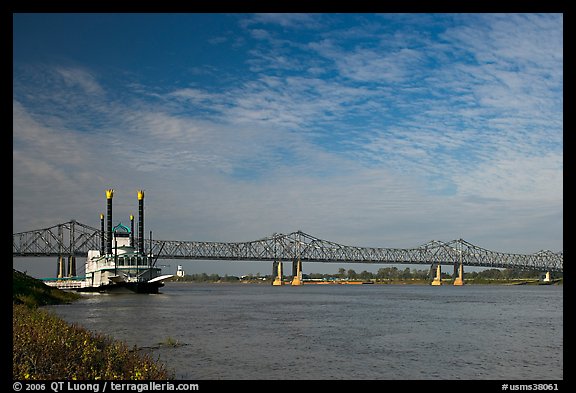 Mississippi River, paddle steamer, and bridge. Natchez, Mississippi, USA