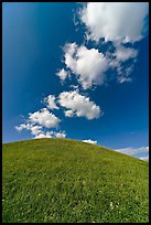 Rounded hill and clouds,  Emerald Mound. Natchez Trace Parkway, Mississippi, USA