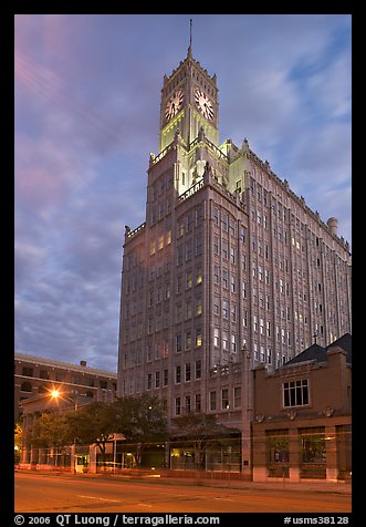 Art Deco building with clock tower at dusk. Jackson, Mississippi, USA