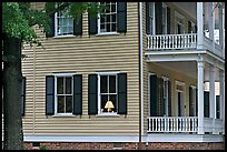 House with lamp inside window. Columbia, South Carolina, USA ( color)