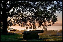 Cannon, and bench overlooking Beaufort Bay at sunrise. Beaufort, South Carolina, USA