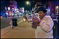 Jazz Street Musician on Beale Street by night. Memphis, Tennessee, USA