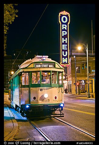Trolley and Orpheum theater sign by night. Memphis, Tennessee, USA (color)