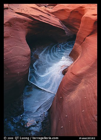 Frozen water and red sandstone, Water Holes Canyon. Arizona, USA
