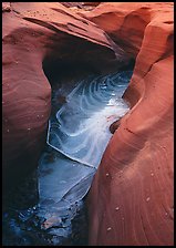 Frozen water and red sandstone, Water Holes Canyon. Arizona, USA