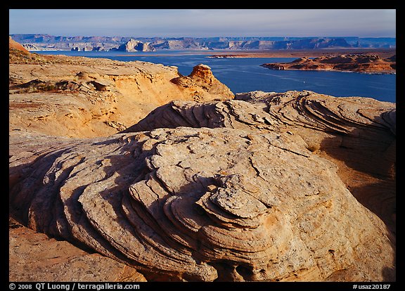 Sandstone Swirls and Lake Powell, Glenn Canyon National Recreation Area, morning. USA (color)