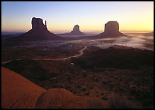 Mittens, sunrise. Monument Valley Tribal Park, Navajo Nation, Arizona and Utah, USA (color)