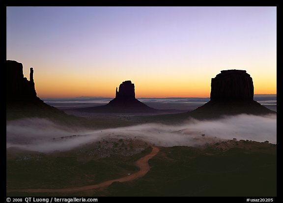 Mittens and fog, sunrise. Monument Valley Tribal Park, Navajo Nation, Arizona and Utah, USA (color)