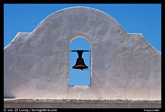 Bell and whitewashed wall, San Xavier del Bac Mission. Tucson, Arizona, USA (color)